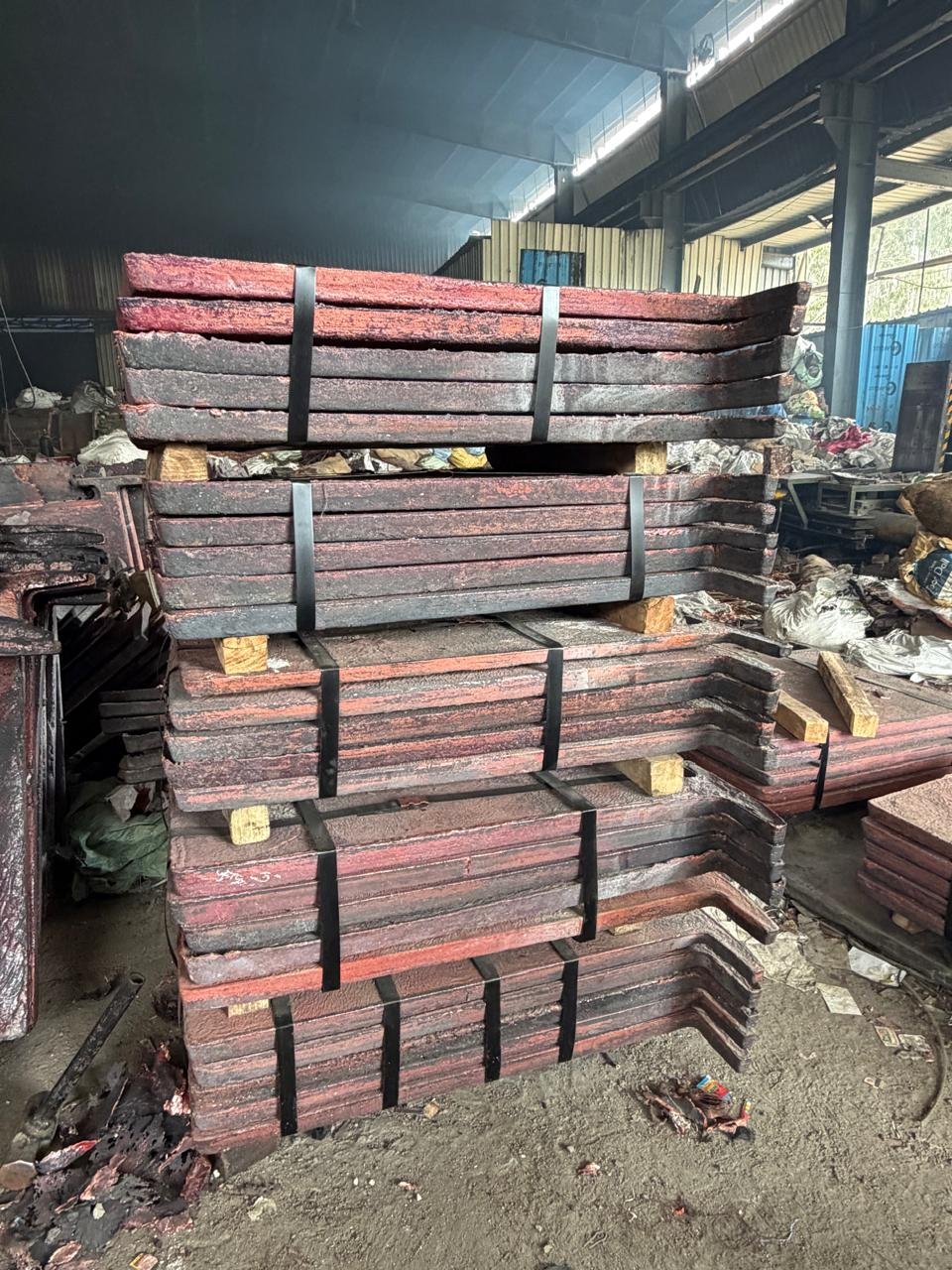 Stacked copper anodes strapped for despatch